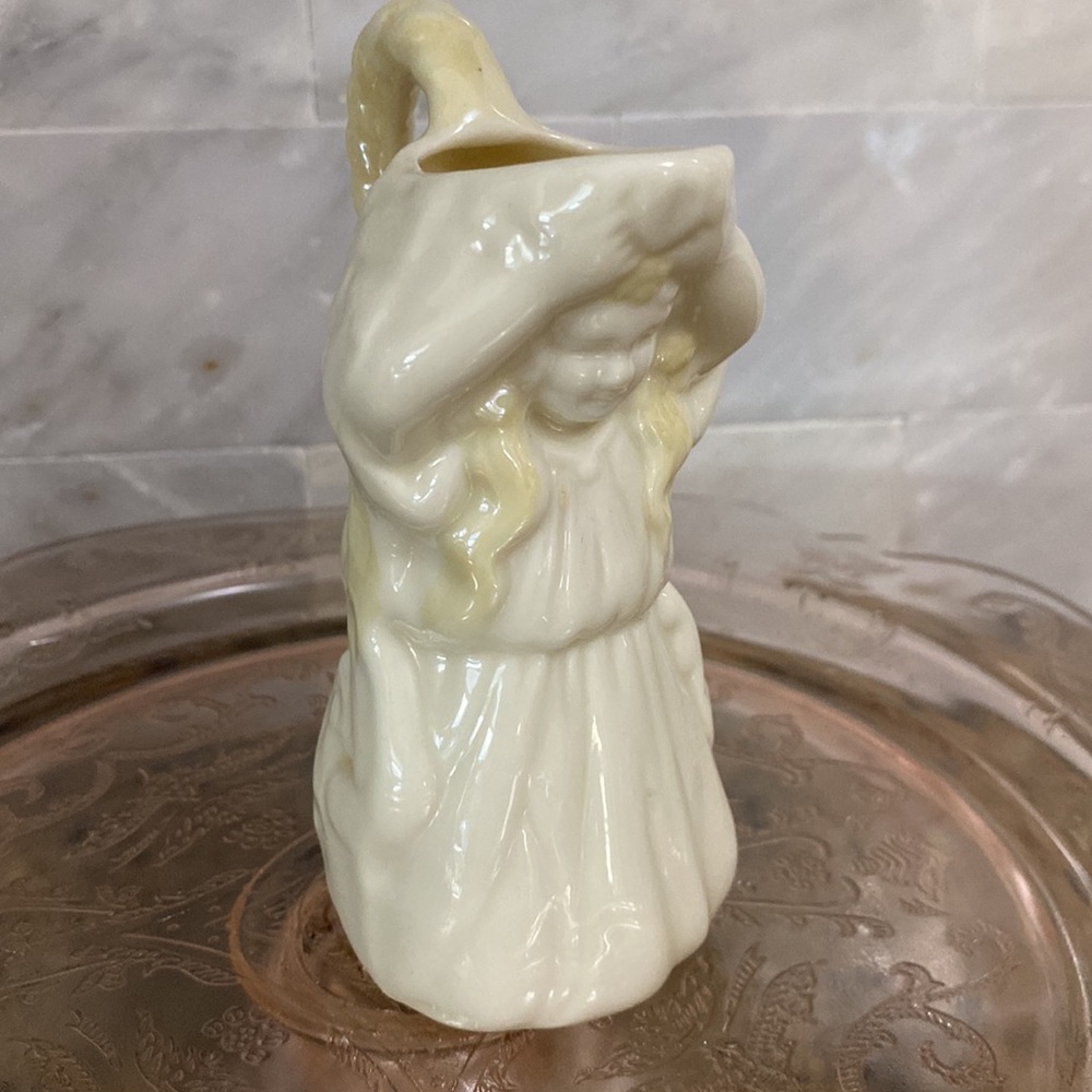 Belleek Ireland porcelain creamer, girl, kneeling. Vintage